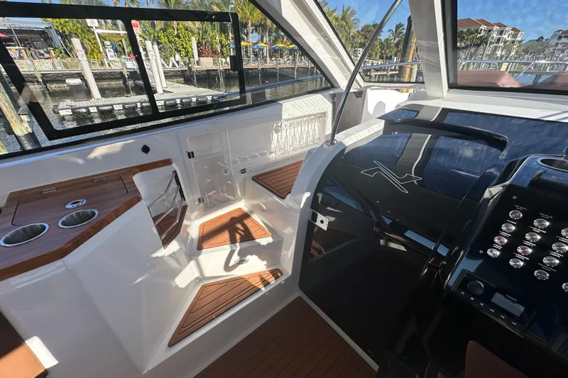  Yacht Photos Pics Interior of 2025 NX Boats 370, featuring sleek design and modern controls.