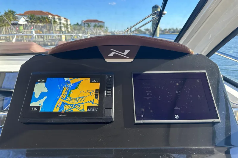 Yacht Photos Pics Dashboard of 2025 NX Boats 370 with navigation and control screens.