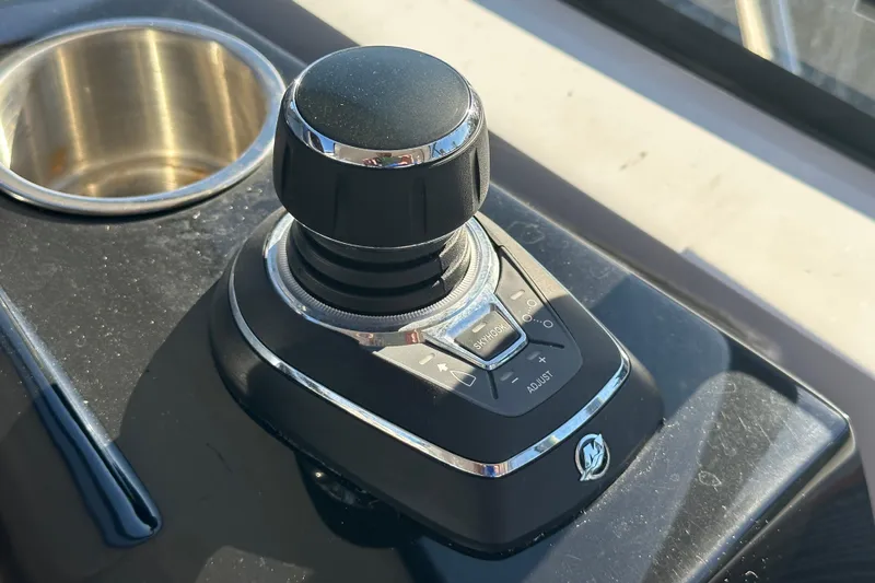  Yacht Photos Pics Joystick control on 2025 NX Boats 370 dashboard, featuring sleek design and functionality.