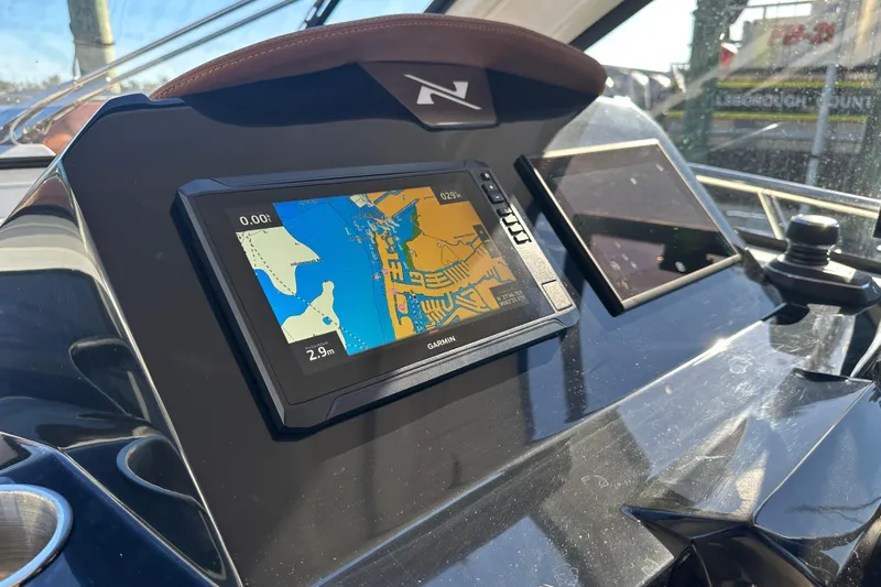  Yacht Photos Pics 2025 NX Boats 370 dashboard with Garmin navigation display.
