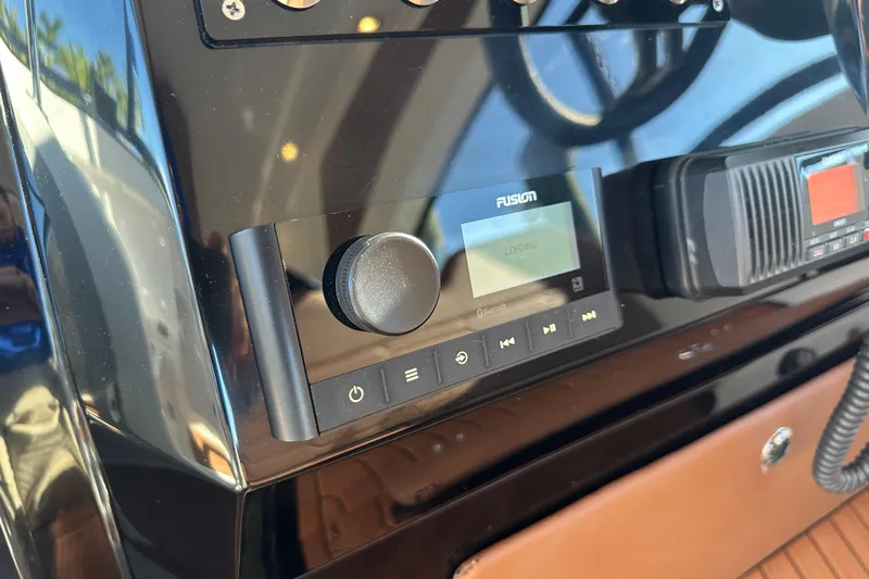  Yacht Photos Pics Control panel of 2025 NX Boats 370 featuring Fusion audio system.