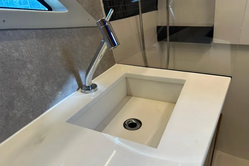  Yacht Photos Pics Modern sink and faucet in 2025 NX Boats 370 interior.