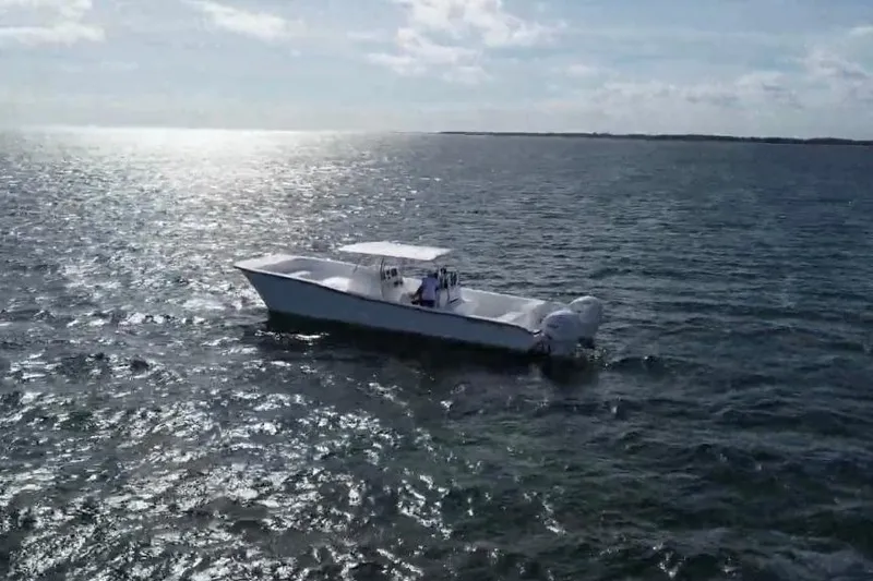 N/a Yacht Photos Pics 2025 AmeraCat 39 boat cruising on open water under a sunny sky.