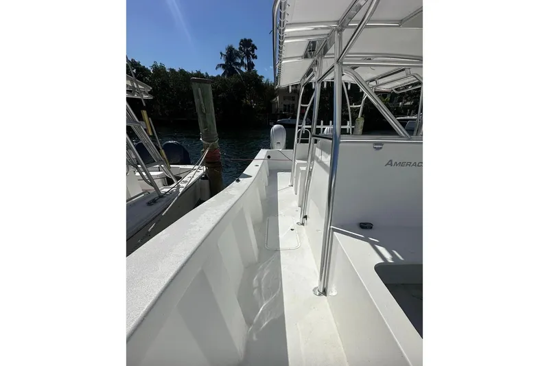 N/a Yacht Photos Pics 2025 AmeraCat 39 boat docked, featuring sleek design and sturdy metal framework.