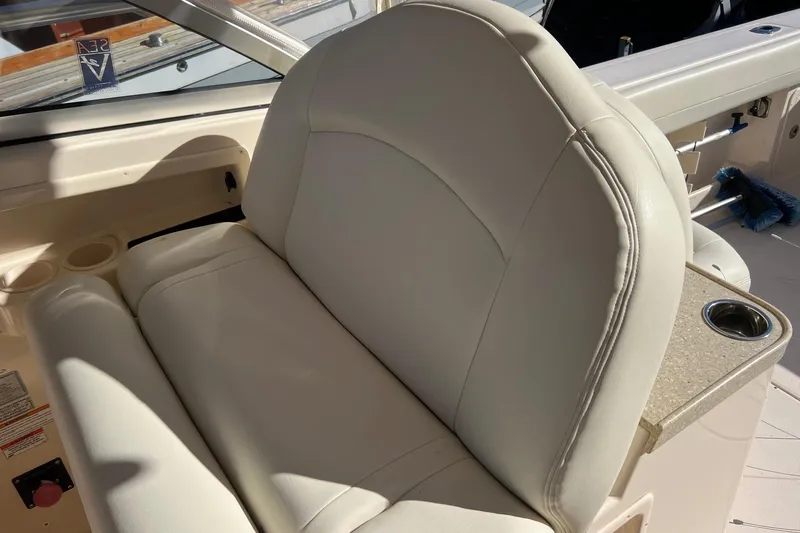  Yacht Photos Pics Luxurious seating on 2011 Grady-White Freedom 307 boat with cup holder.