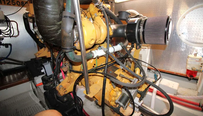 The Concession Yacht Photos Pics Engine room of 2001 Selene 53 Pilothouse, showcasing complex machinery and components.