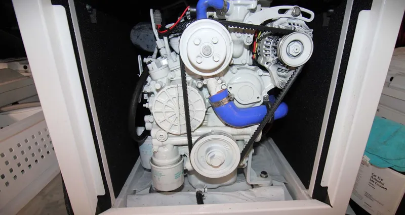 The Concession Yacht Photos Pics Engine compartment of a 2001 Selene 53 Pilothouse with visible belts and hoses.