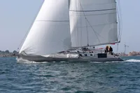 Sailing yacht Finot Open 50, 2005 model, gliding on open water.