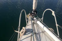 Bow of 2005 Finot Open 50 sailboat with ropes and fittings.