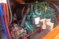 Engine of a 2005 Finot Open 50 sailboat, showcasing intricate mechanical components.