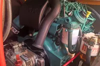 Engine compartment of a 2005 Finot Open 50 sailboat, showcasing mechanical components.