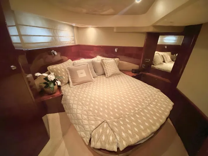  Yacht Photos Pics Luxurious bedroom interior of 2006 Viking Princess V 58 yacht with elegant bedding and decor.