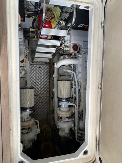  Yacht Photos Pics Engine room of 2006 Viking Princess V 58 yacht, showing machinery and equipment.