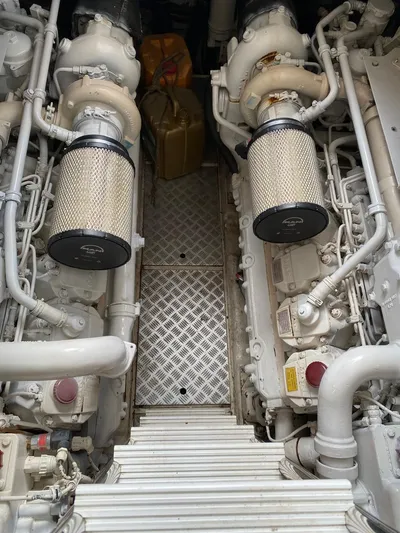  Yacht Photos Pics Engine room of 2006 Viking Princess V 58 yacht, showcasing dual engines and mechanical components.