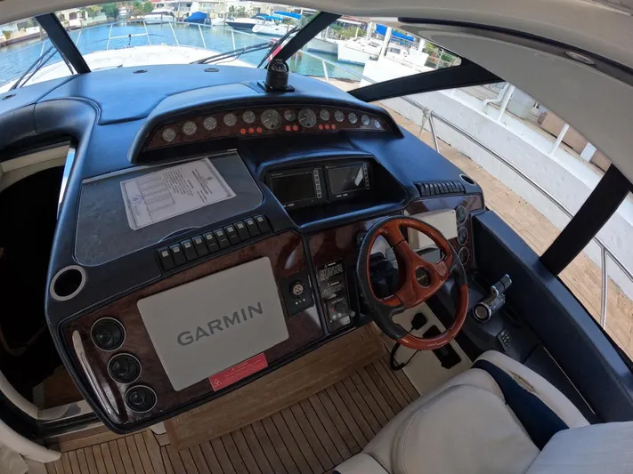  Yacht Photos Pics Control panel of 2006 Viking Princess V 58 yacht with Garmin navigation system.