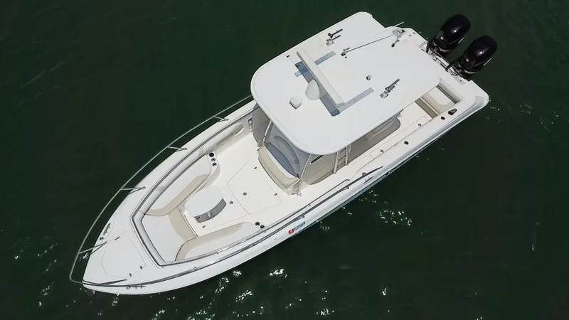  Yacht Photos Pics 2008 Boston Whaler 320 Outrage boat with twin engines, aerial view.
