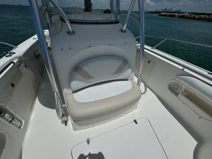  Yacht Photos Pics 2008 Boston Whaler 320 Outrage boat interior with seating and ocean view.