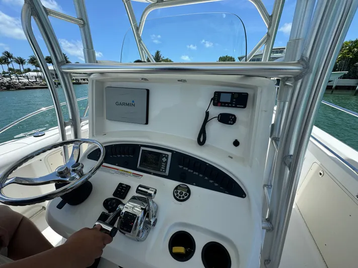  Yacht Photos Pics 2008 Boston Whaler 320 Outrage boat console with Garmin navigation system.