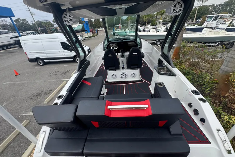  Yacht Photos Pics 2025 Monterey Elite 27 OB boat interior with modern seating and sleek design.