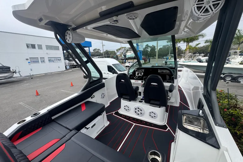 Yacht Photos Pics 2025 Monterey Elite 27 OB boat interior with modern seating and sleek design.