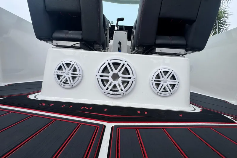  Yacht Photos Pics 2025 Monterey Elite 27 OB boat interior with JL Audio speakers and stylish seating.