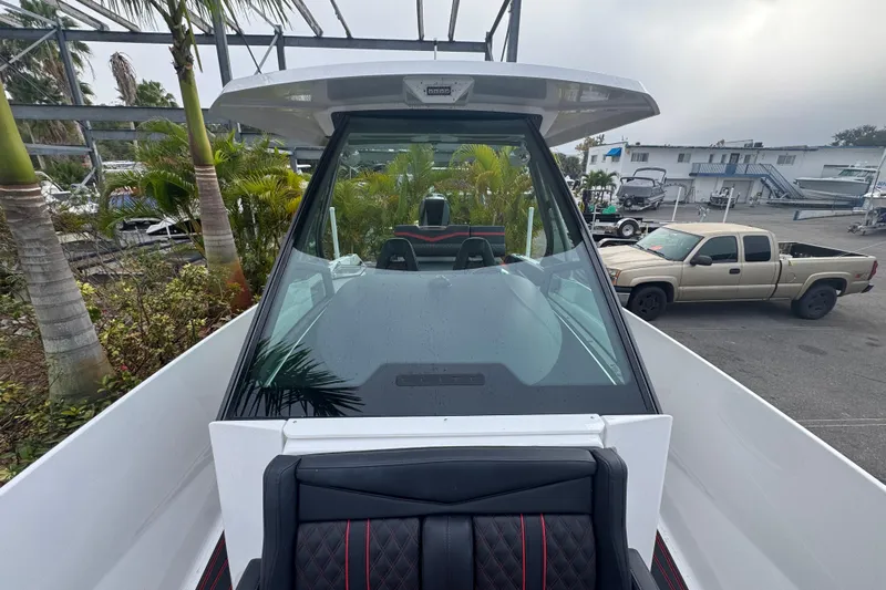  Yacht Photos Pics 2025 Monterey Elite 27 OB boat with sleek design, viewed from the front deck.