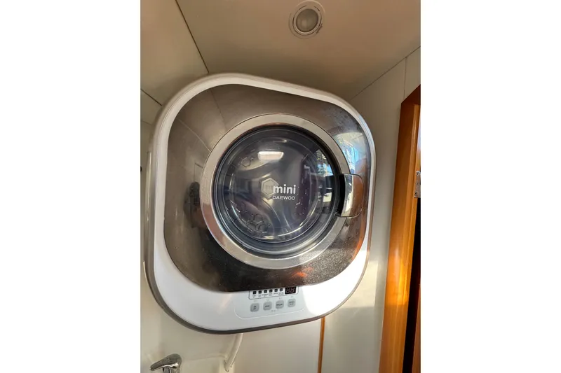 Betty Mae Yacht Photos Pics Compact Daewoo mini washing machine inside 2006 Lagoon 380 yacht.