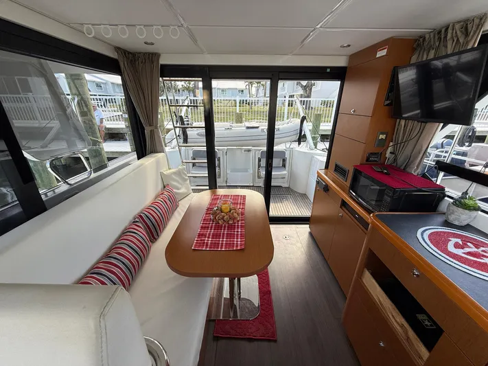 Seven Grand Yacht Photos Pics Interior of 2016 Beneteau Swift Trawler 30 with cozy seating and modern amenities.