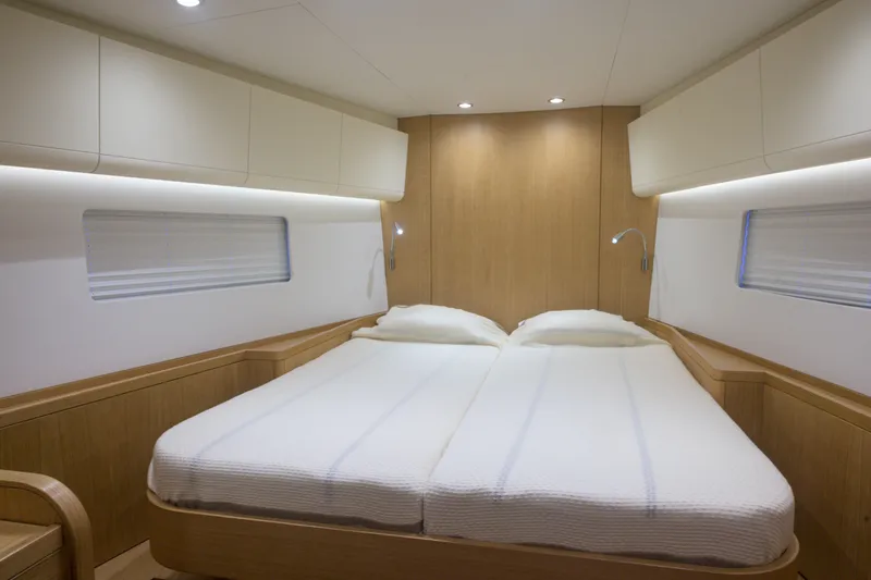 Invictus Yacht Photos Pics Luxurious cabin interior of 2023 Nautor Swan 55 yacht with modern design.