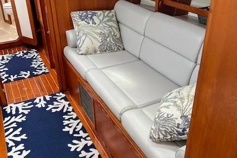 Agandau Yacht Photos Pics Luxurious 2003 Caliber 40LRC yacht interior with elegant seating and nautical-themed decor.