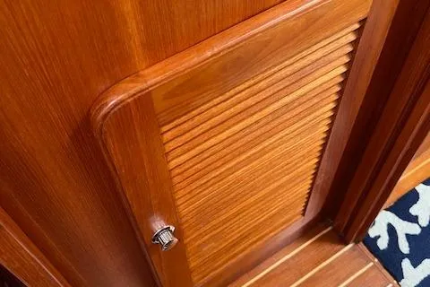 Agandau Yacht Photos Pics Wooden cabinet door on 2003 Caliber 40LRC yacht interior.