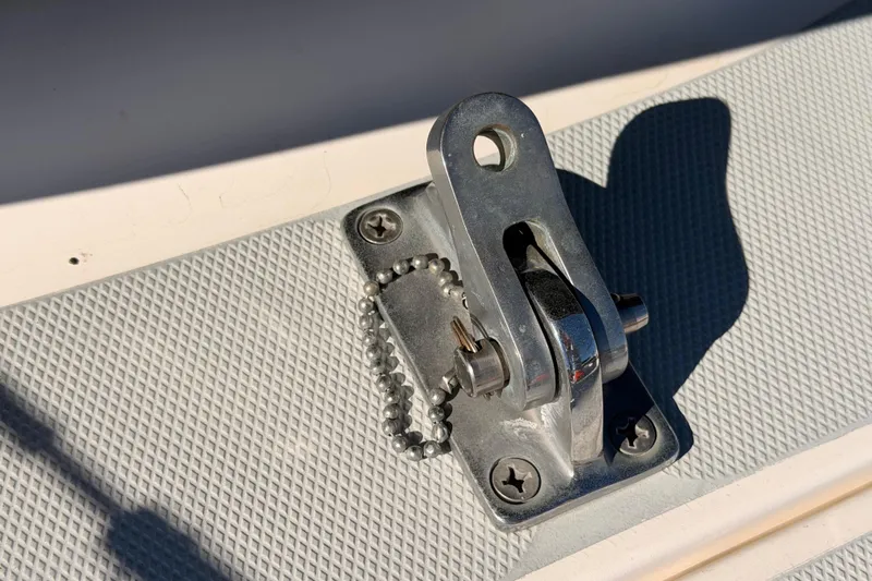 Thursday's Child Yacht Photos Pics Stainless steel fitting on 2005 Hunter Passage 456 boat deck, close-up view.