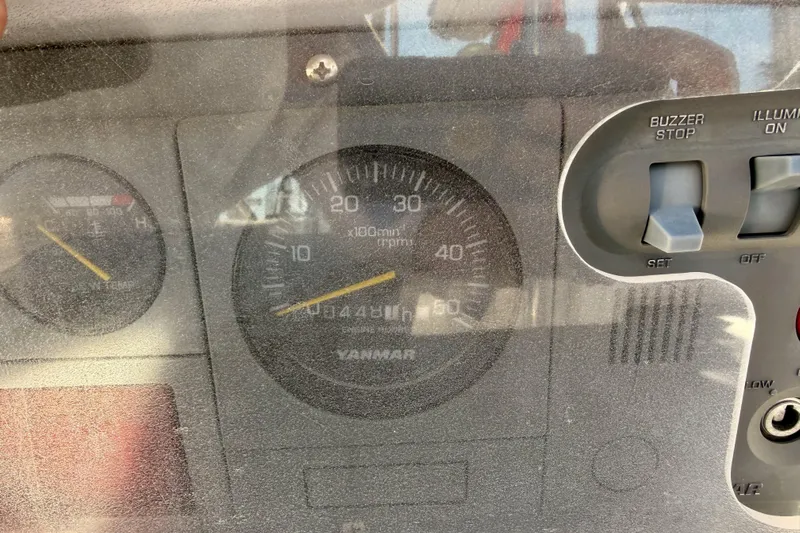 Thursday's Child Yacht Photos Pics Close-up of a 2005 Hunter Passage 456 boat dashboard with Yanmar tachometer.