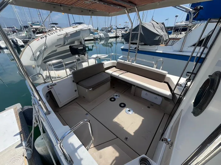 Ben Yacht Photos Pics 2011 Ranger Tugs R-27 boat interior with seating, docked at marina.