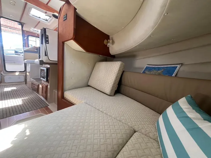 Ben Yacht Photos Pics Interior of 2011 Ranger Tugs R-27 boat with cozy seating and modern amenities.