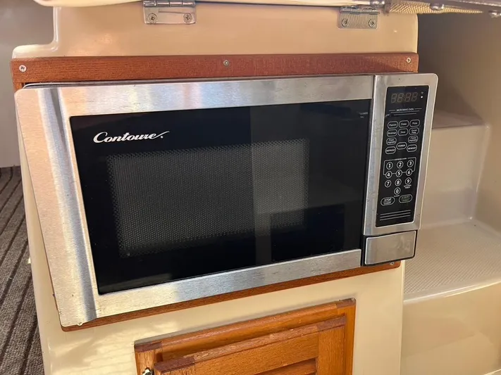 Ben Yacht Photos Pics Microwave in 2011 Ranger Tugs R-27 boat interior, featuring Contoure brand.