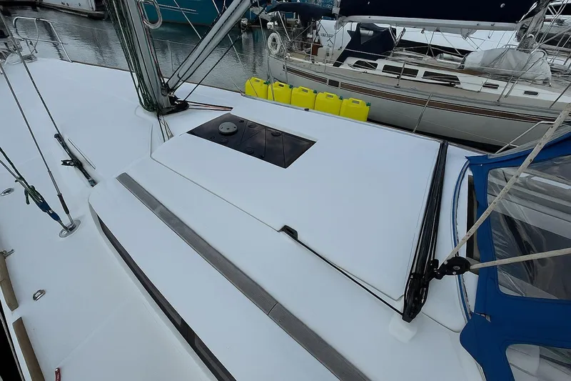 Corrine Yacht Photos Pics 2015 Jeanneau 409 sailboat deck with rigging and yellow fuel containers.