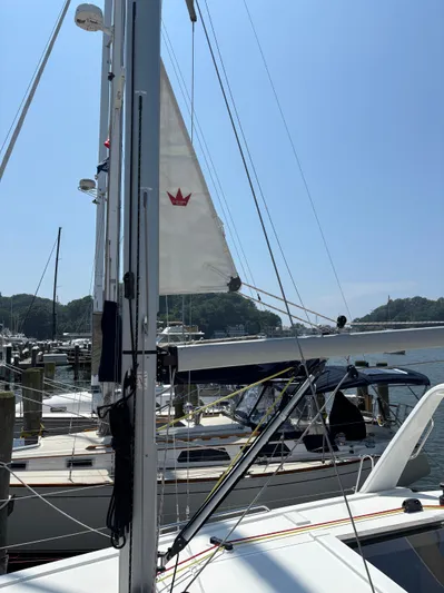 Aveyron Yacht Photos Pics Sailboat Beneteau Oceanis 35.1, 2021 model, docked at marina under clear blue sky.