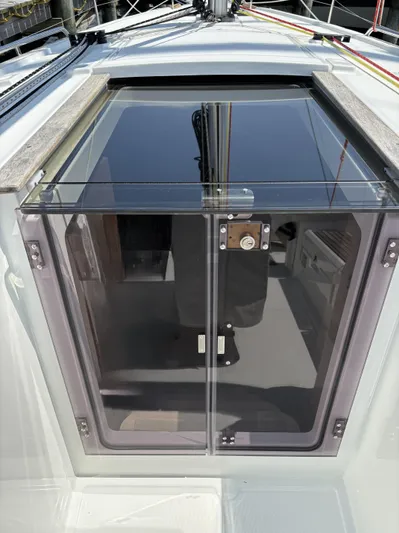 Aveyron Yacht Photos Pics Beneteau Oceanis 35.1 yacht hatch, 2021 model, featuring sleek glass doors and modern design.