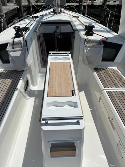 Aveyron Yacht Photos Pics Cockpit of 2021 Beneteau Oceanis 35.1 sailboat with teak seating and winches.