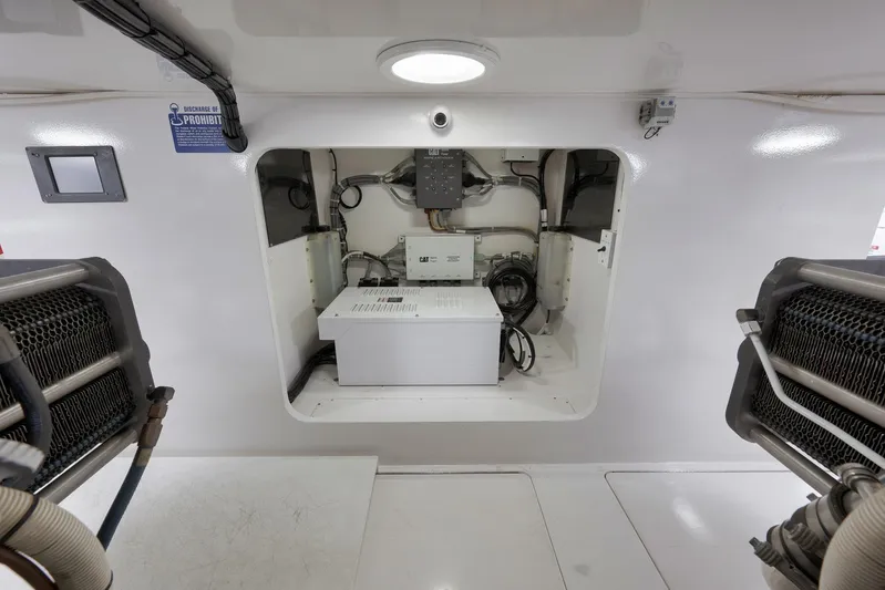 Even Flow Yacht Photos Pics Engine room of 2009 Viking Convertible yacht, featuring electrical components and wiring.