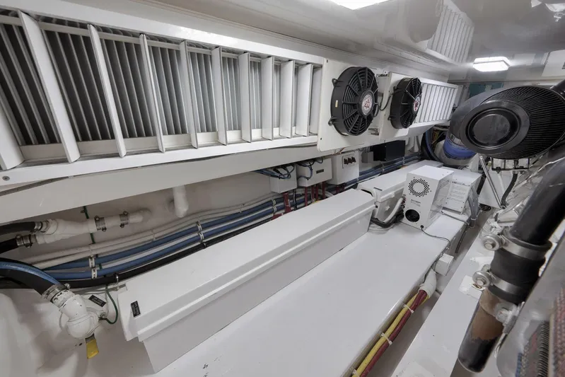 Even Flow Yacht Photos Pics Engine room of a 2009 Viking Convertible yacht, featuring ventilation and mechanical systems.