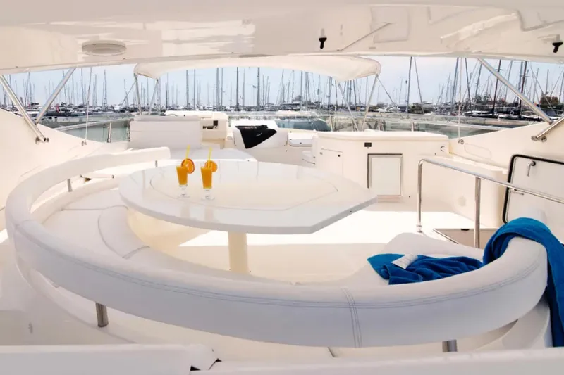  Yacht Photos Pics Luxurious 2003 Ferretti Yachts 760 interior with elegant seating and marina view.