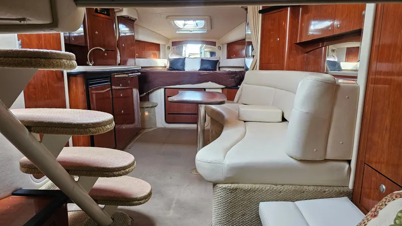 Sea Jazz Yacht Photos Pics Luxurious 2007 Sea Ray 340 Sundancer interior with elegant seating and wood finishes.
