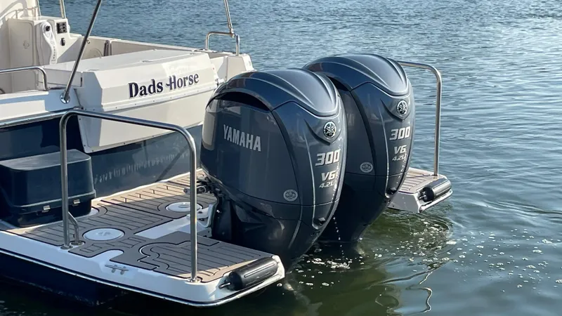  Yacht Photos Pics 2022 Cutwater C-32 Sedan with twin Yamaha 300 V6 outboard engines on water.