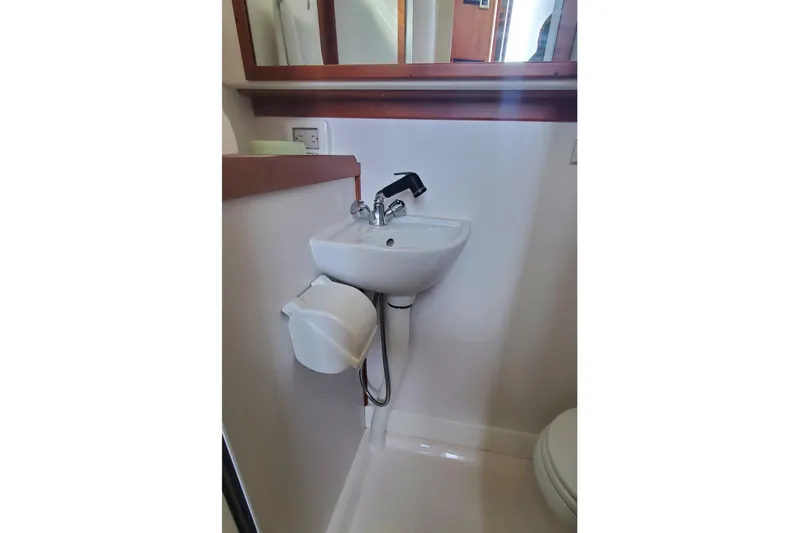 Brio Yacht Photos Pics Compact bathroom sink in 2012 Sabre 48 Salon Express yacht interior.