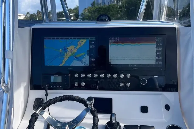  Yacht Photos Pics 2024 Contender 30 Tournament boat dashboard with navigation and control systems.