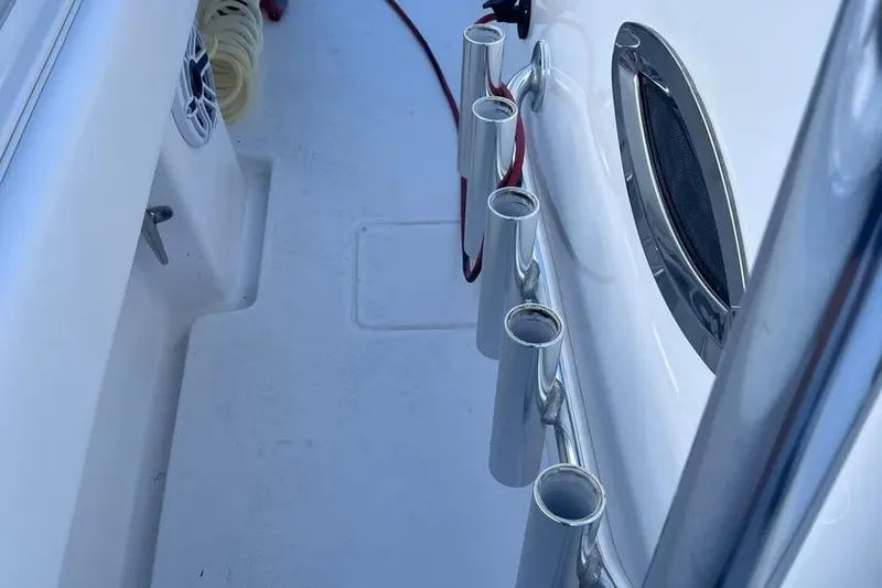  Yacht Photos Pics 2024 Contender 30 Tournament boat deck with rod holders and speaker.