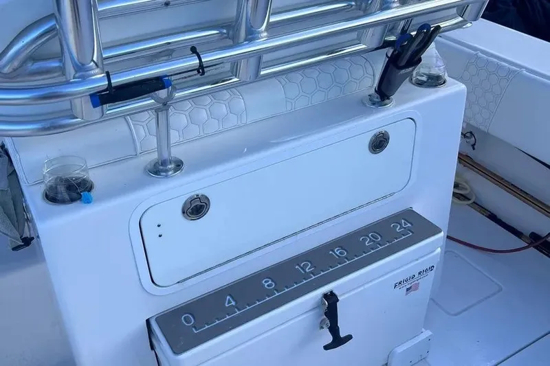  Yacht Photos Pics 2024 Contender 30 Tournament boat console with rod holders and measuring scale.