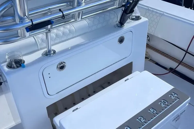  Yacht Photos Pics 2024 Contender 30 Tournament boat with fishing rod holders and measuring board.